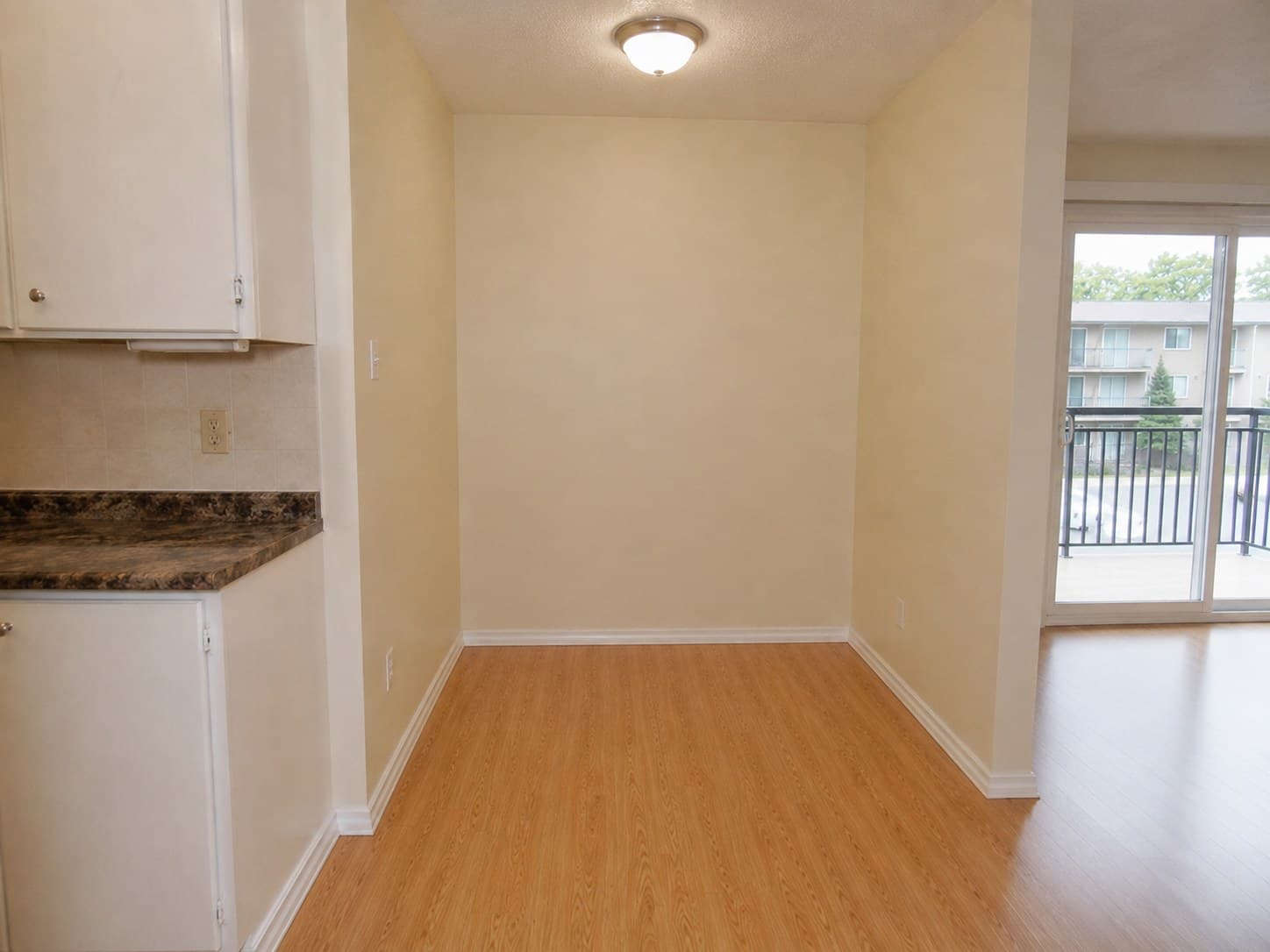 Empty one-bedroom, dining nook before virtual staging