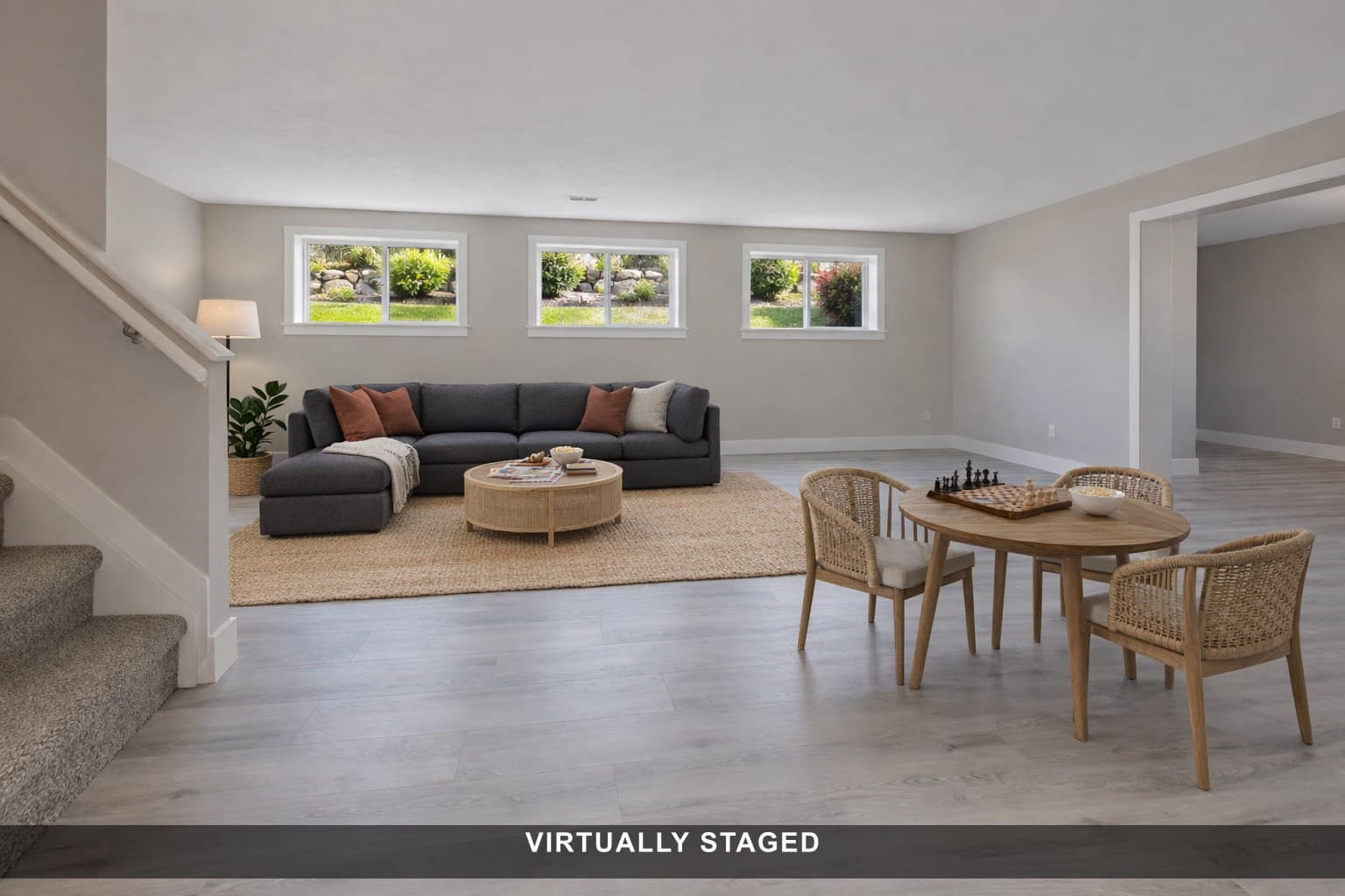 Virtually staged: Empty basement rec room, furnished